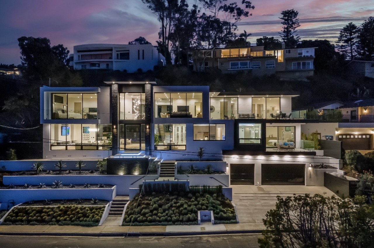 https://ansconstruction.us/wp-content/uploads/2026/10/exterior-night-hillside.jpg